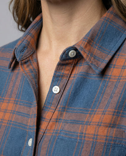 checkered shirt blouse with long sleeves, button front closure, and classic collar.