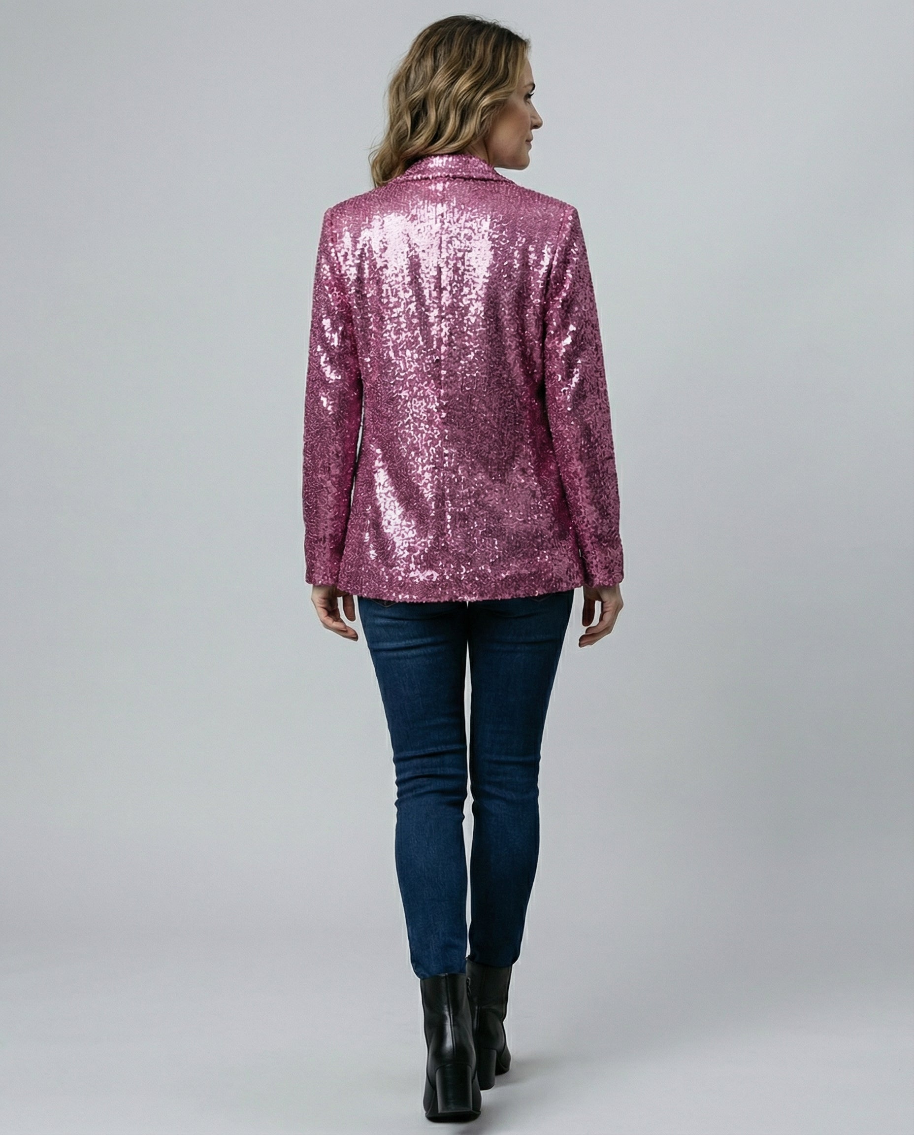 sequin blazer with padded shoulders, open front design, and fully lined construction.