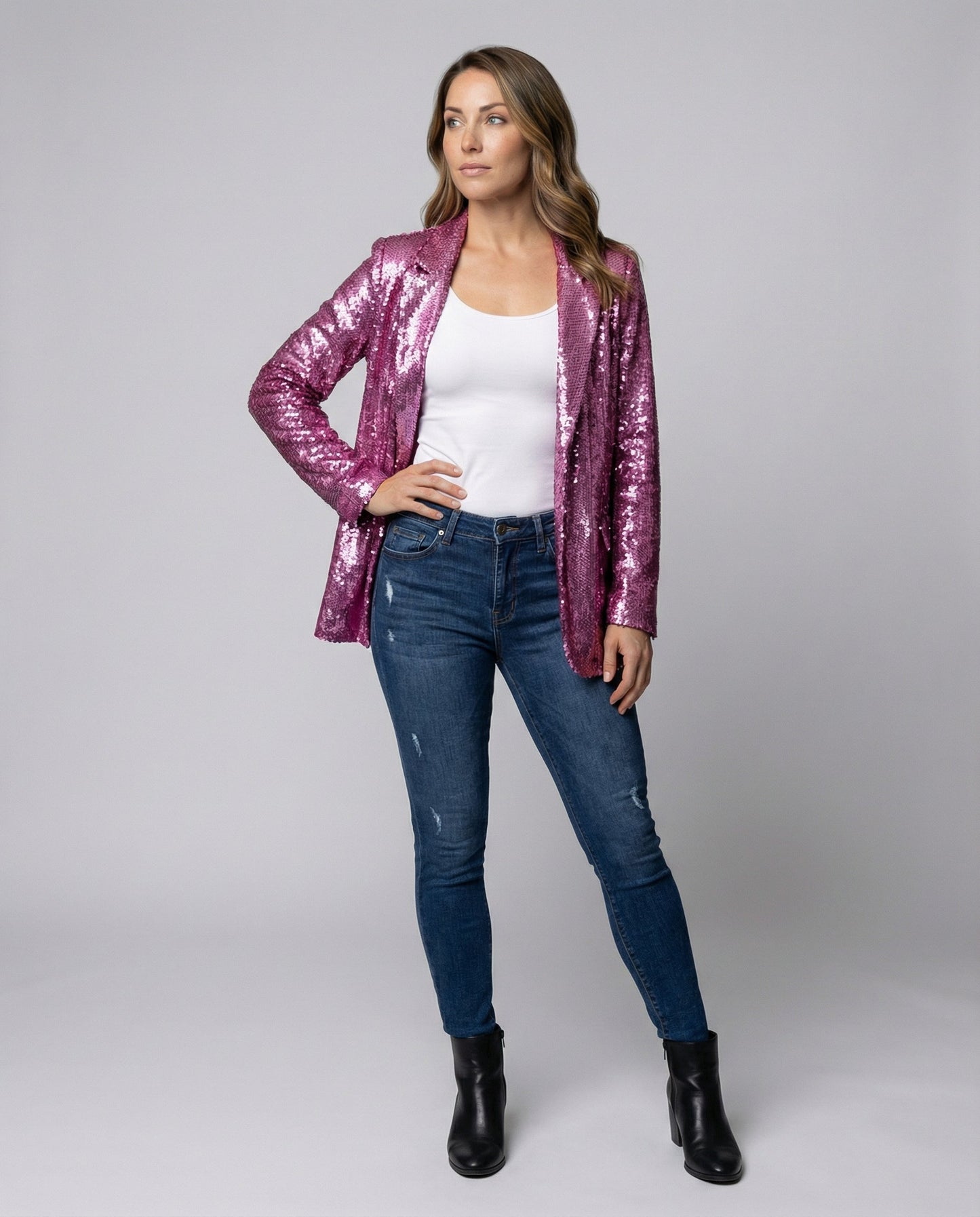 sequin blazer with padded shoulders, open front design, and fully lined construction.